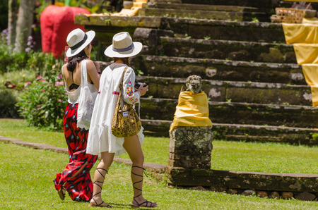 chinese tourist houses with short dress in temple during sightseeingのeditorial素材