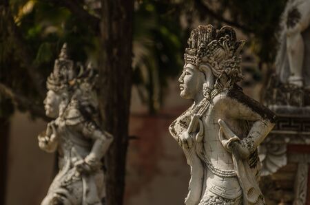 two sculptures of stone in a templeの写真素材