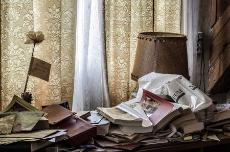 old objects at window in abandoned house