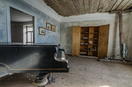 piano with box in abandoned old houseのeditorial素材