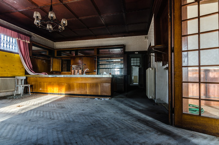 bar and serving in old abandoned innの写真素材