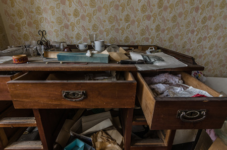 old table and open loads in a houseの写真素材