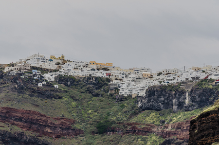 greek houses on the mountain and seaの写真素材