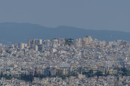 many buildings and houses in athens greeceの写真素材