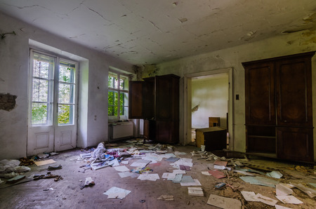 house and many papers on the floorの写真素材