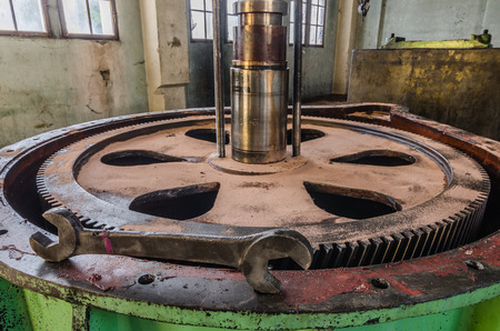fork wrench on gearbox in abandoned factory buildingの写真素材