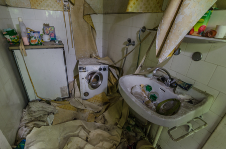 Devastated bathroom in an abandoned houseのeditorial素材