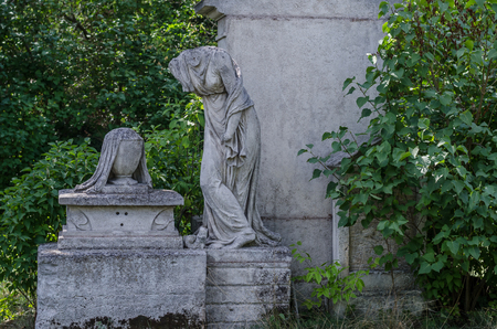 figure without a head at a graveの写真素材