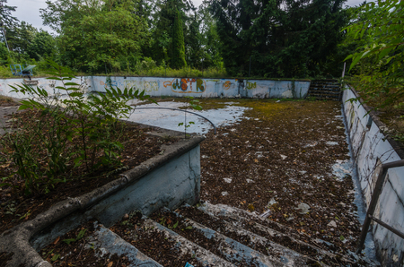 abandoned old empty swimming poolの写真素材