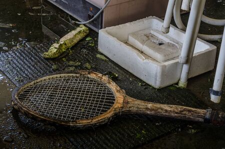 old wooden tennis racket on the floorの写真素材