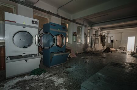 big washing machines in abandoned hospitalの写真素材