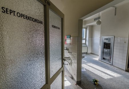 Open door to operating room in abandoned hospitalのeditorial素材