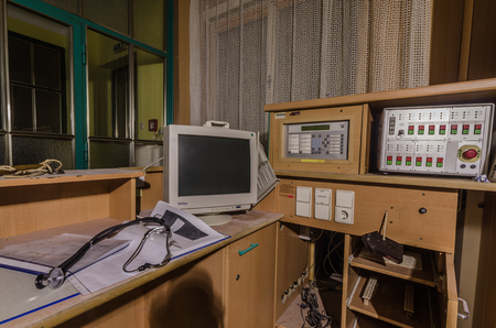 Reception room with stethoscope in an abandoned hospitalのeditorial素材