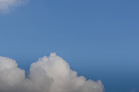 white cloud in the blue sky in spring