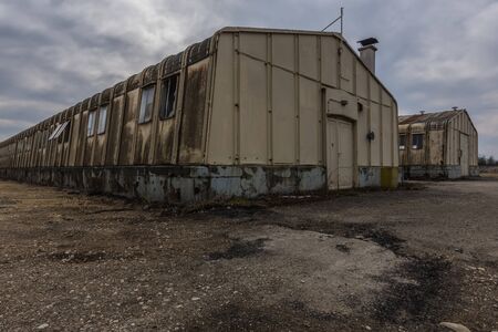 old steel building with windowsの写真素材