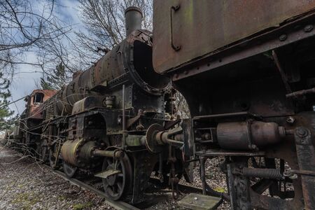 rusty old steam locomotive in nature