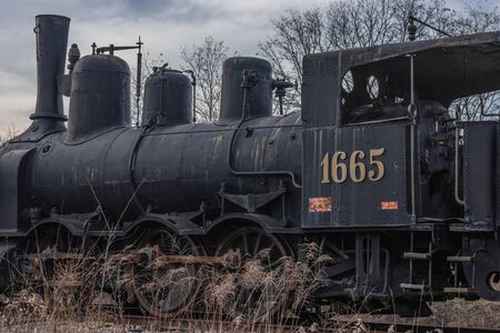 old rusty steam locomotive 1665 on a railway
