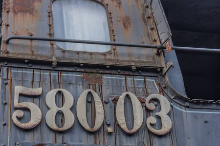 rusty old number on an old steam locomotive