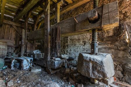 winepress in a wooden house in the mountains