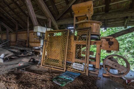 Historic old wooden machine in an abandoned houseのeditorial素材