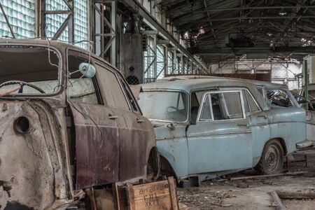 detail of old abandoned car repair shopの写真素材