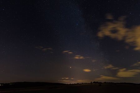 colorful milky way during a lunar eclipse at night