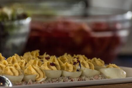 stuffed eggs at a buffet during a celebration on a shipの写真素材