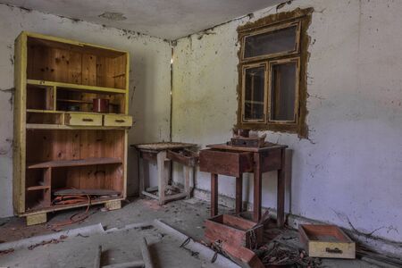 closet made of wood in a room with a window in a houseの写真素材