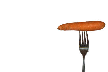 carrot with fork and white backgroundの写真素材