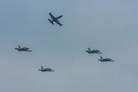fast planes fly in formation the sky at a air showのeditorial素材