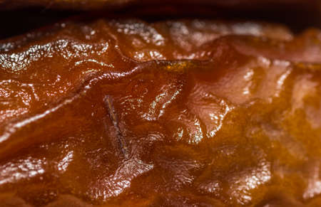dried sweet date macro view from the surface