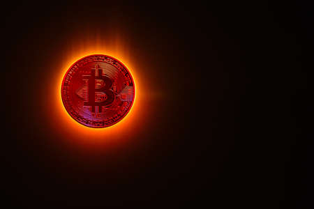red glowing bitcoin instead a burning sun with black background