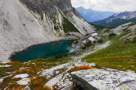 amazing green blue lake like the caribian sea in  the mountains of austria on vacationの写真素材