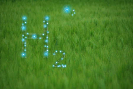 green meadow and h2 hydrogen letters for energy with green and blueの写真素材