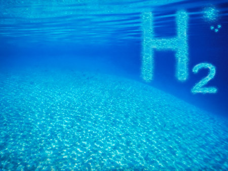 3D illustration renewable pure energy blue h2 hydrogen in deep blue clear sea water with reflection...