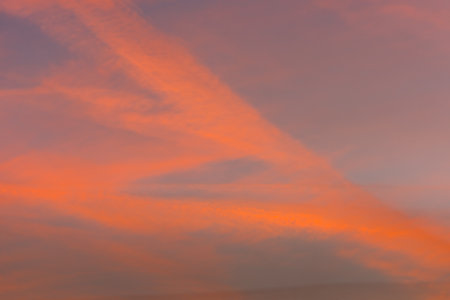 colorful red clouds at the sky during sundown in the winterの写真素材