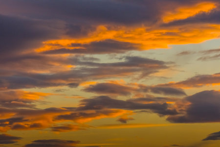 amazing colorful clouds at the sky during sundown in the winterの写真素材