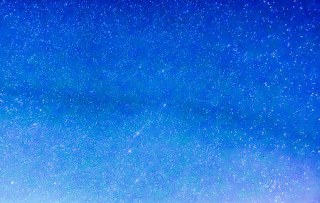 millions of stars at a blue sky in the night and winterの写真素材