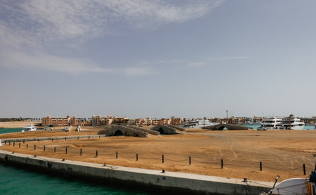 port ghalib in egypt with lot of sand bridges and houses at the red seaの写真素材
