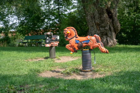 Horse and train spring rides at public parkの写真素材
