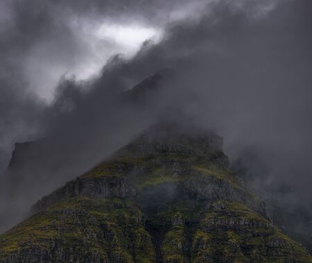 Close-up of fog covered mountain tops, Faroe Islandsの写真素材