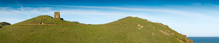 Panoramic view with Doyden Castle near Port Quin in north Cornwall. Picture taken from a public footpath.の写真素材
