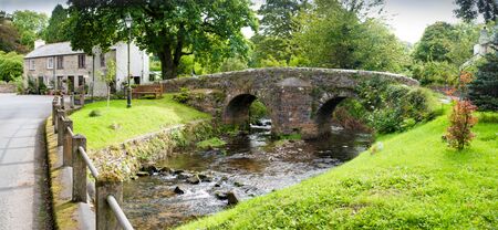 Panoramic view of an old stone bridge in the picturesque village Altarnun in north Cornwall.