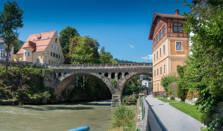 Riverside scenery in Murau. Murau is a historic town in Upper Styria in the valley of the Mur in Austria.の写真素材