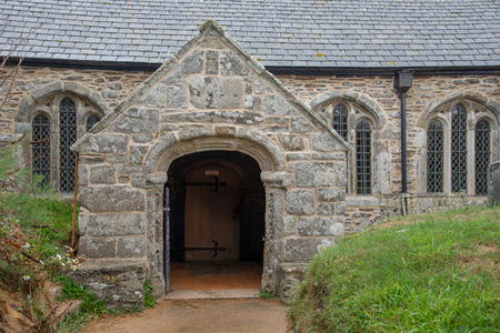 Entrance to the Parish Church of St Winwaloe in Gunwalloe, Cornwallの写真素材