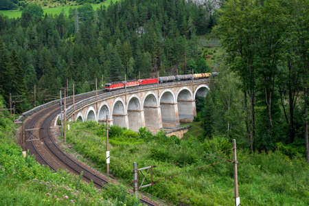 Kalte Rinne Viaduct with train on the Semmering Railway.