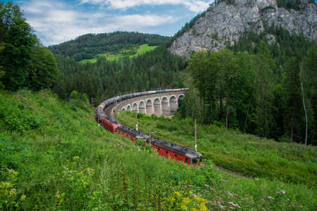 "Kalte Rinne" Viaduct with train on the Semmering Railway.の写真素材