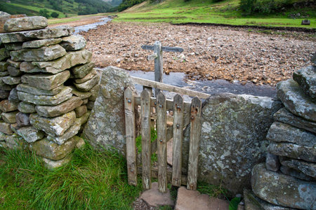 Wooden gate on a hiking path in the Yorkshire Dales, England, UK.