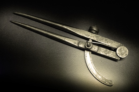 An old style drawing compass in detail の写真素材