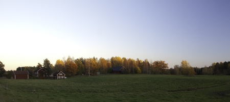 A landscape shot of the swedish countryside in the fall の写真素材